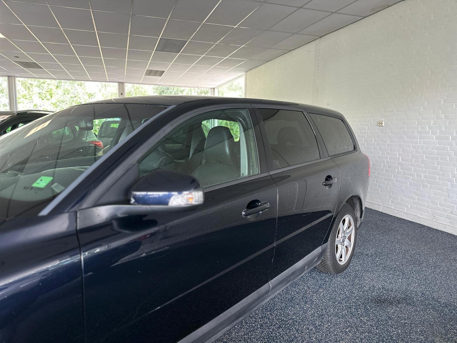 Volvo V70 2.4D Limited Edition | Automaat | Trekhaak | Cruis, 15 km/l, Zwart, Blauw, Diesel