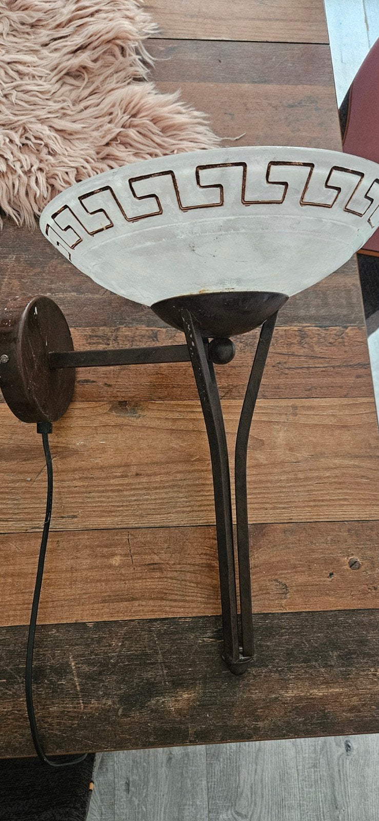 Griekse wandlamp, Ophalen