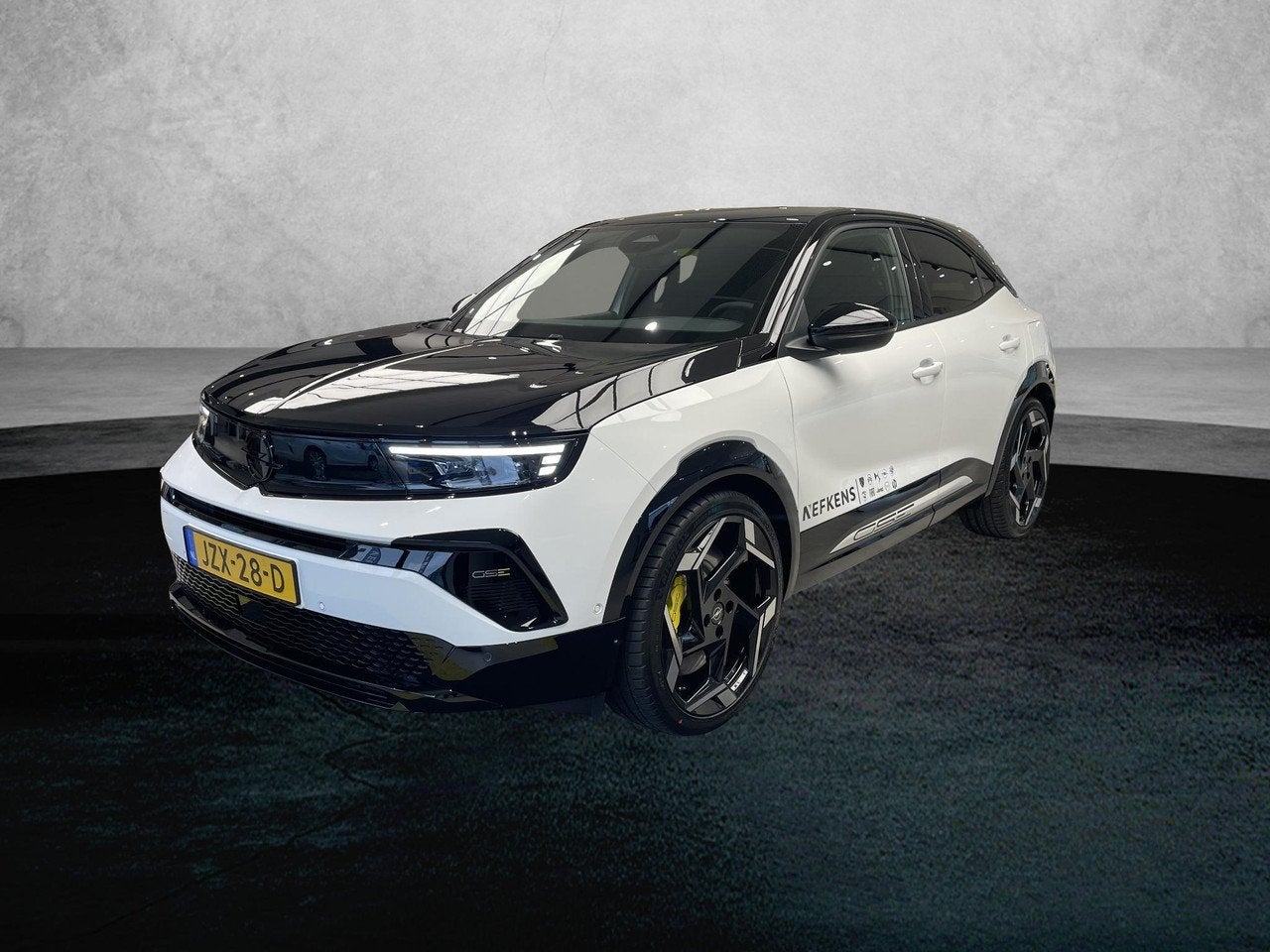 Opel Mokka-e Electric SUV GSE 54 kWh 281 pk | Demo | Tot 8 j, Auto's, Automaat, Dealer onderhouden, Mokka-e, Alcantara