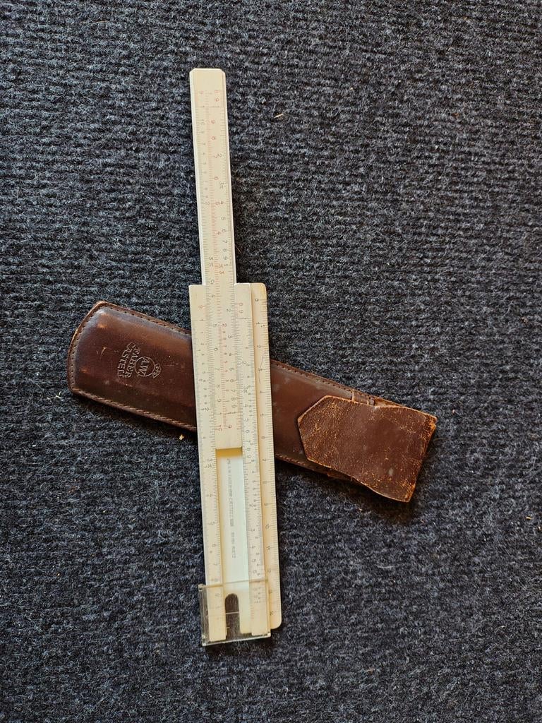 Vintage A.W. Faber-Castell rekenliniaal met leren etui, Antiek en Kunst, Ophalen of Verzenden