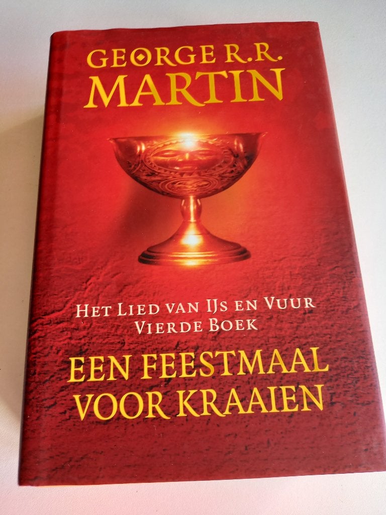 George R.R. Martin: een Feestmaal voor Kraaien, Boeken, Ophalen of Verzenden, Zo goed als nieuw