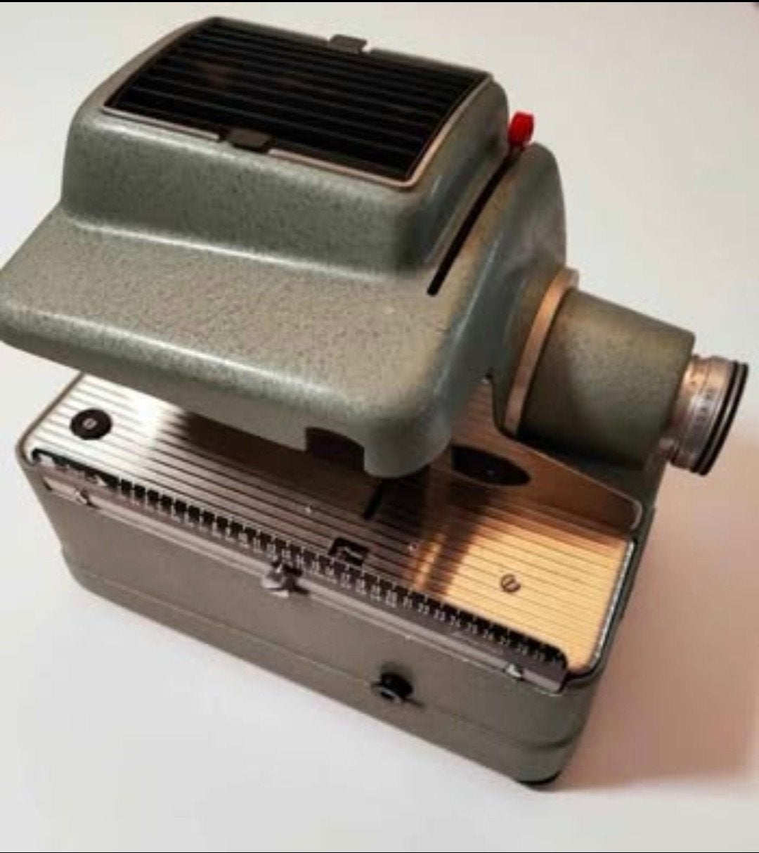 Vintage Liesegang diaprojector met koffer en 4 dia-broden, Ophalen