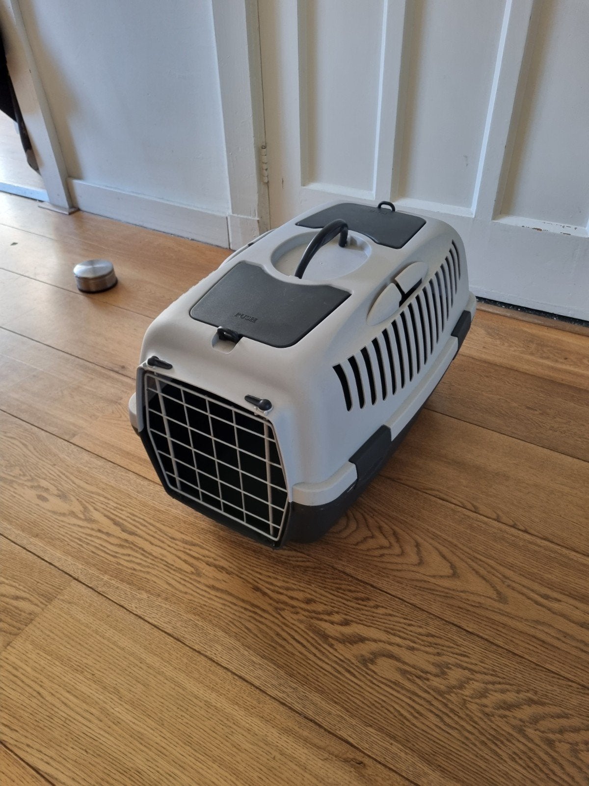 Transportbox voor een kat, Ophalen