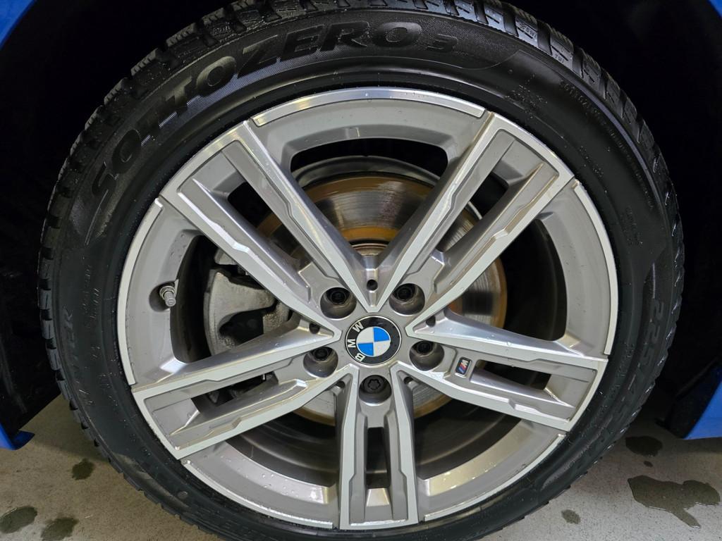 BMW 1-serie 118i High Executive Edition M-Sport Pano Leder N, Auto's, Gebruikt, Blauw, Bedrijf, 3 cilinders