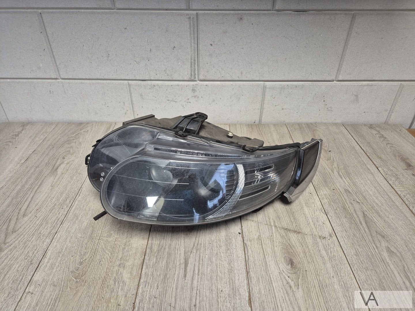 Koplamp XENON links voor Saab 9-5 facelift vanaf 2005 €250, Gebruikt, -, -, Ophalen of Verzenden