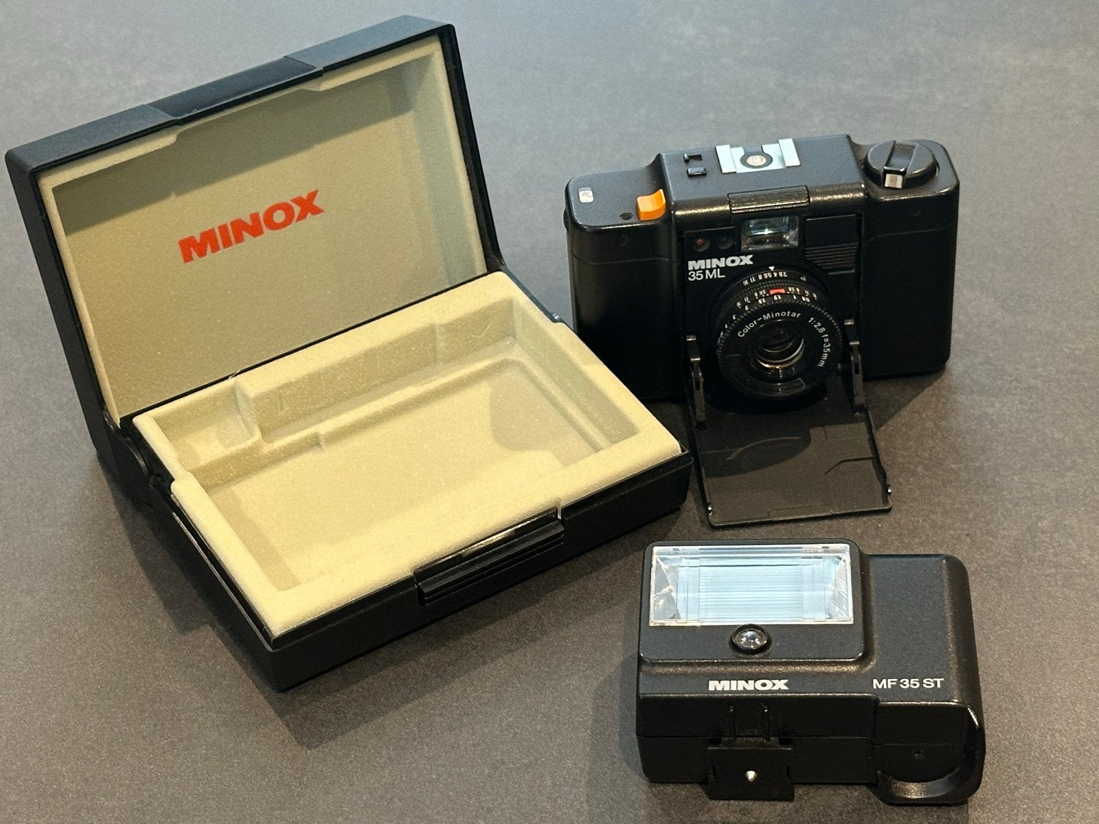 Minox 35 ML Compact Camera met MF 35 ST Flitser en Doos, Ophalen, Gebruikt, Compact, Overige Merken