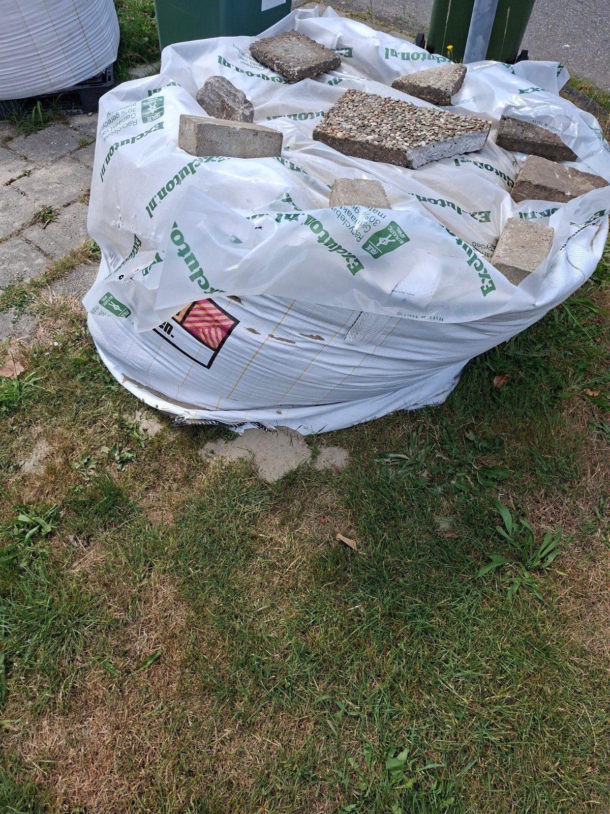 Overgebleven ophoogzand en klinkers in big bag, Tuin en Terras, Tegels en Klinkers, Ophalen of Verzenden