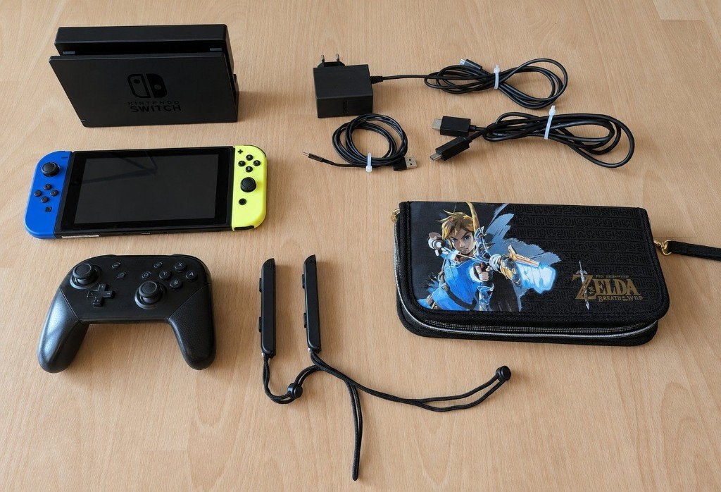 Nintendo Switch + 2 spellen + Pro Controller + hoesje, Overige genres, 1 speler, Ophalen of Verzenden, Zo goed als nieuw