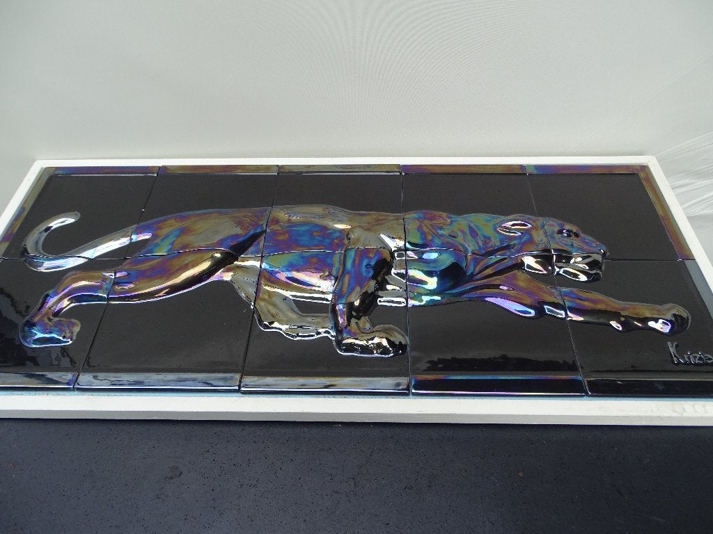 Jachtluipaard/Jaguar tegeltableau, Ophalen