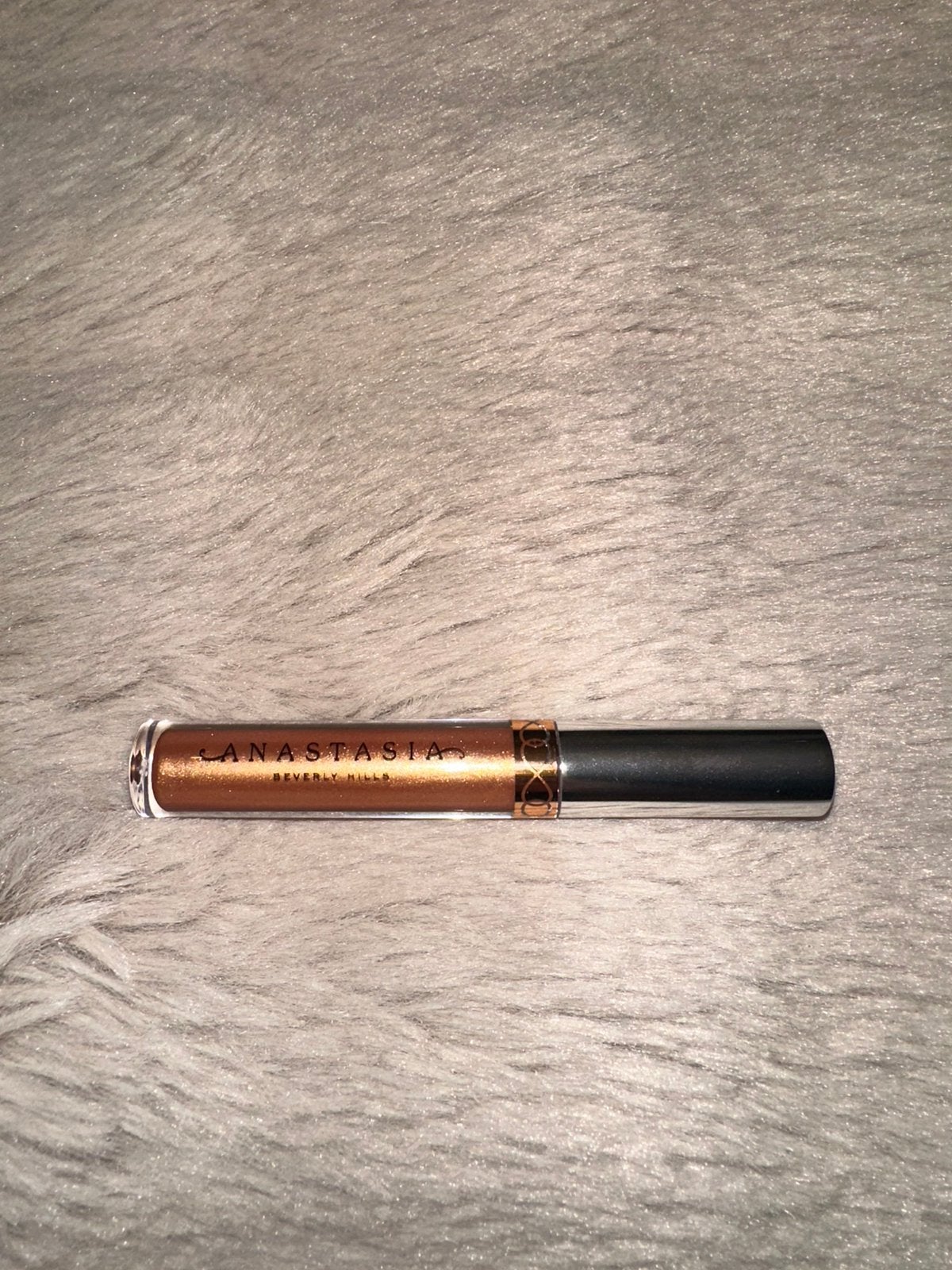 Anastasia Beverly Hills lipgloss kleur Gilded, Ophalen of Verzenden, Zo goed als nieuw, Roze, Lippen