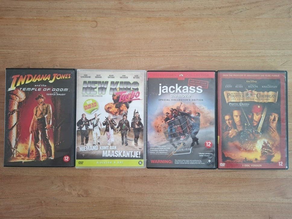 4 Film DVD's Indiana Jones - New Kids - Jackass - Pirates, Cd's en Dvd's, Gebruikt, Ophalen of Verzenden, Vanaf 12 jaar, Inclusief doosje