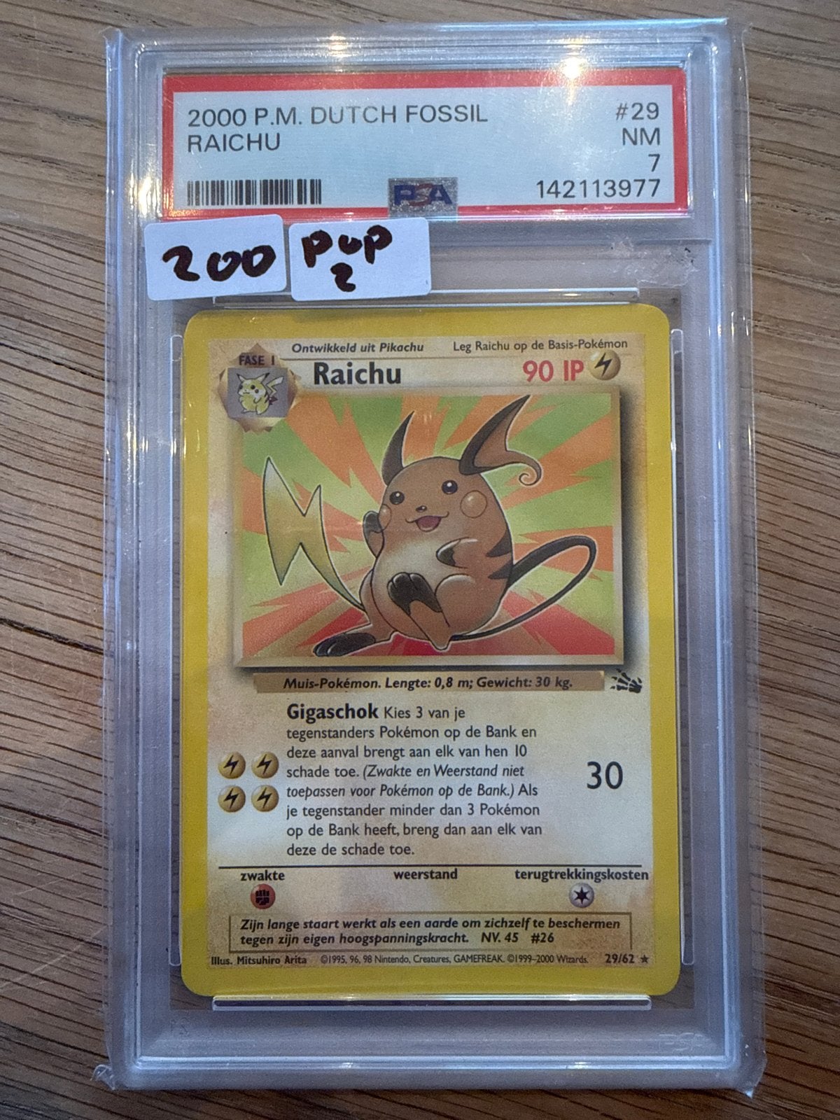 2000 P.M. Dutch Fossil Raichu #29 PSA 7 Pokémon Kaart, Ophalen of Verzenden, Zo goed als nieuw, Losse kaart