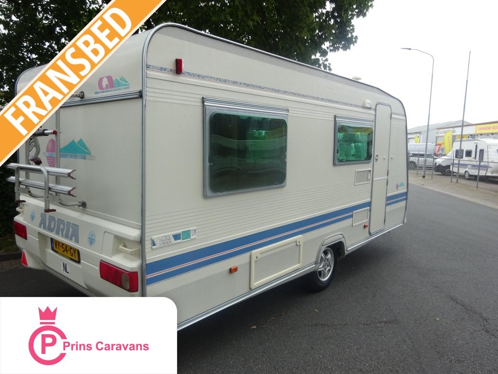Adria Unica 465 Met Frans Bed en Mover, Caravans en Kamperen, Bedrijf, Treinzit, 750 - 1000 kg, 4 tot 5 meter