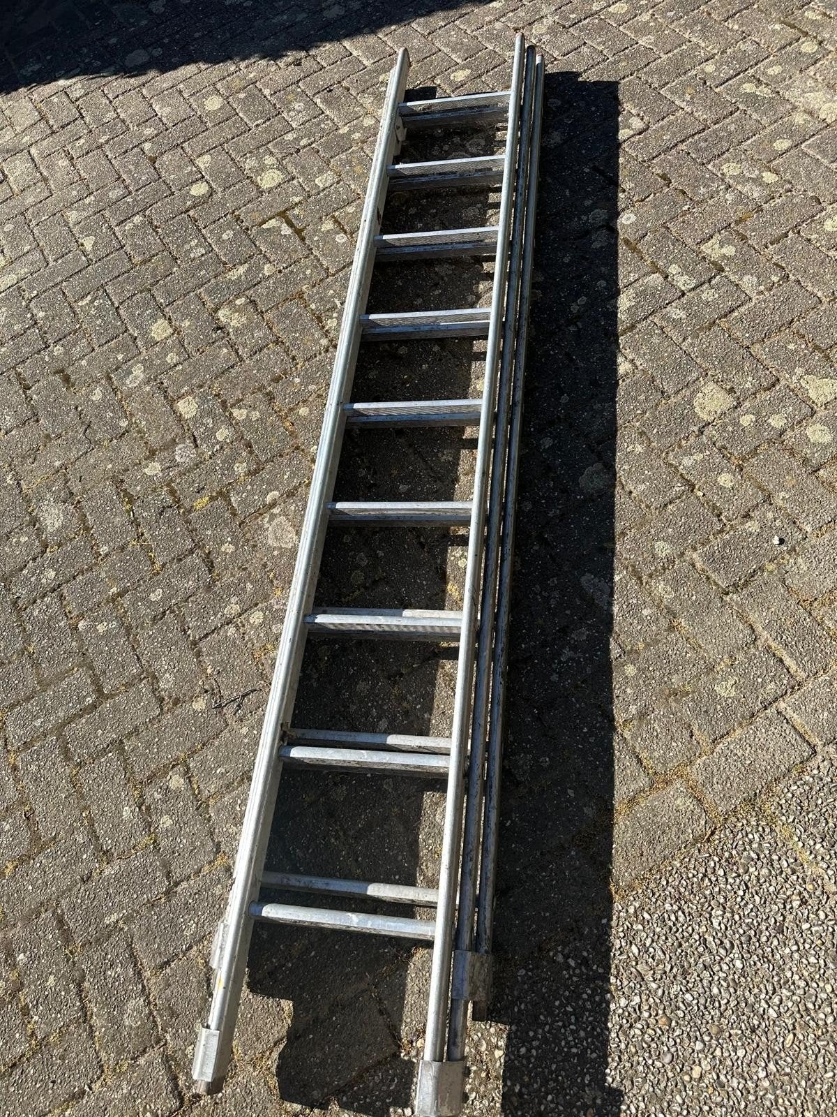Gebruikte uitschuifbare ladder 7 meter ophalen in Roosendaal, Doe-het-zelf en Verbouw, Ladders en Trappen, Ophalen, Gebruikt, Ladder