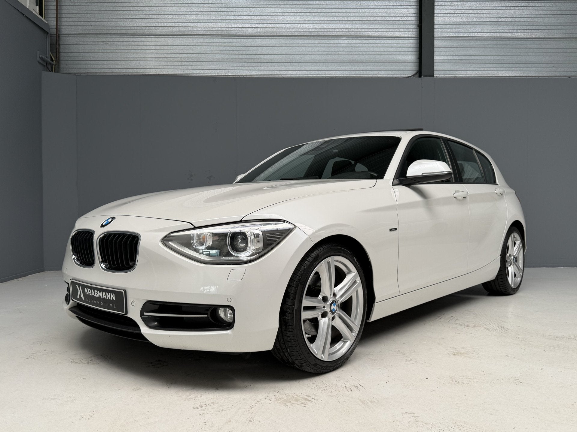 BMW 1-serie 118i Business Sport GARANTIE|Cruise|Navi-Prof|Xe, Auto's, 1-Serie, 4 cilinders, Met garantie (alle), Xenon verlichting