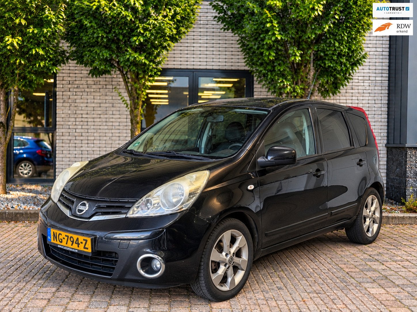 Nissan Note 1.4 Visia Airco|PDC A|APK 2027, Auto's, Voorwielaandrijving, Euro 5, Gebruikt, Zwart