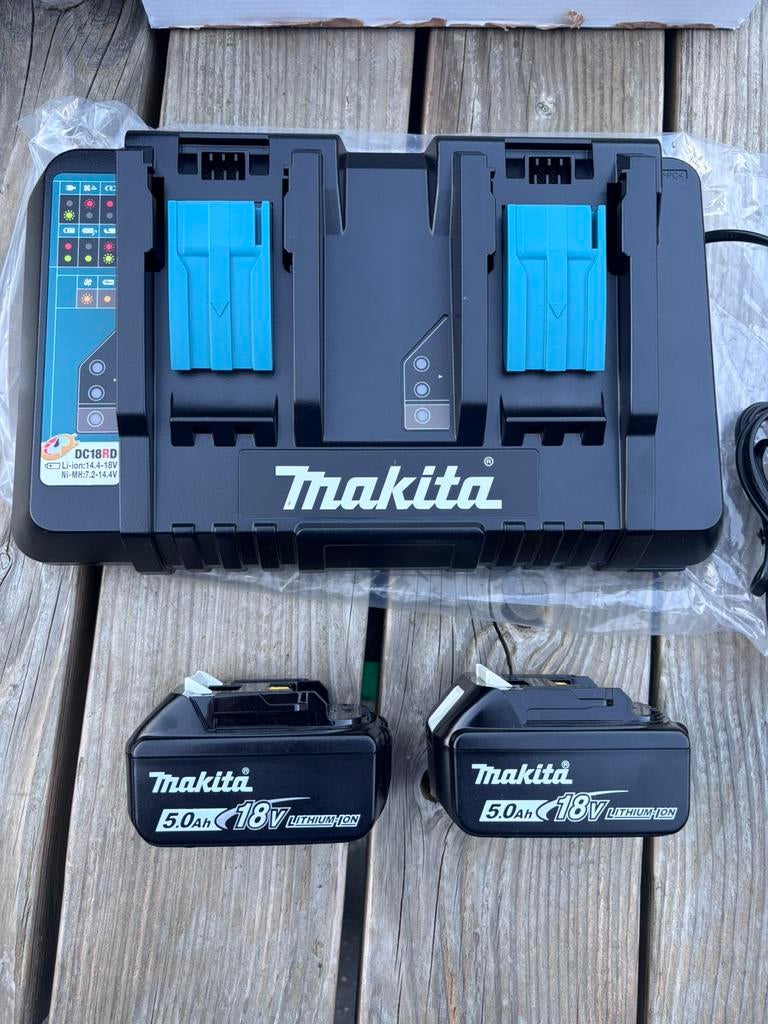 Makita Duolader incl 2 accus 18v 5,0ah nieuw origineel, Ophalen of Verzenden, Nieuw