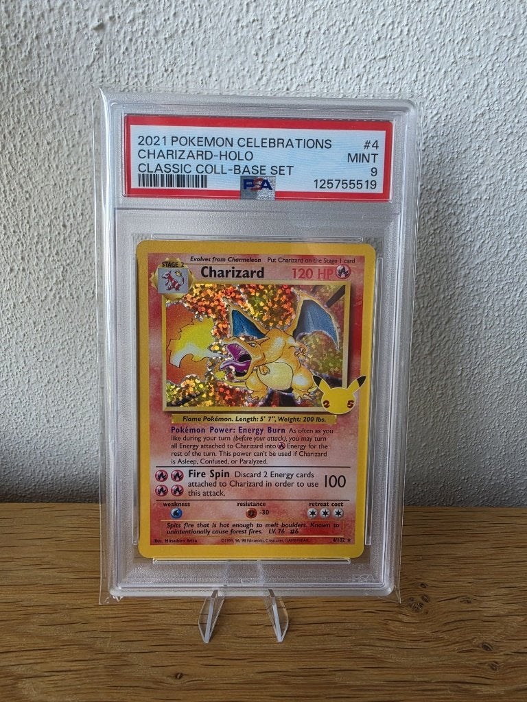 Pokémon Charizard PSA 9 Celebrations 4/102 Holo, Verzenden, Zo goed als nieuw, Losse kaart, Foil