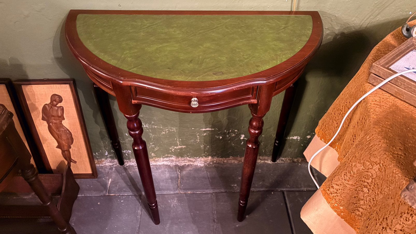 Wandtafel halve maan, Ophalen