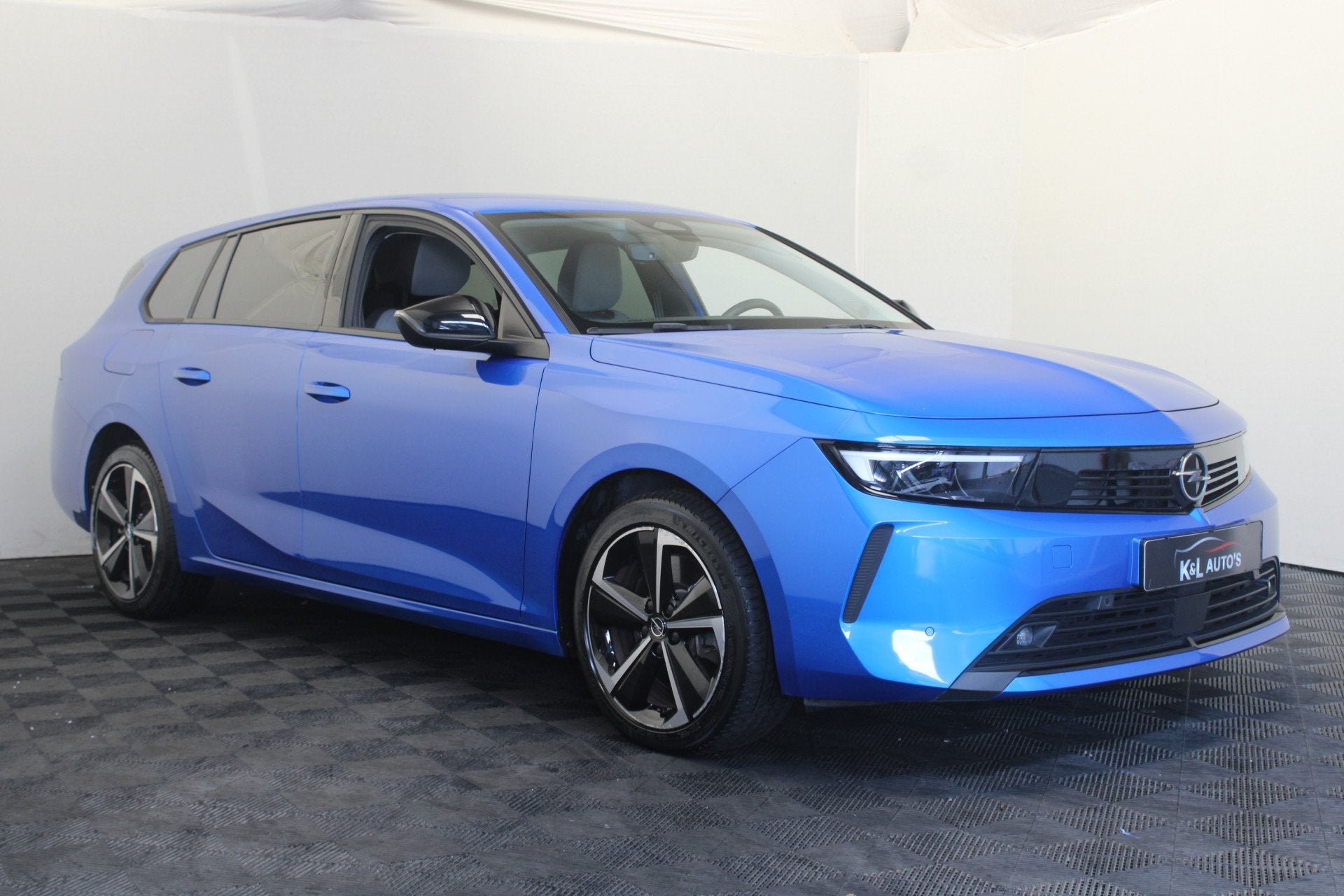 Opel Astra 1.6 Turbo Plug In Hybrid Edition |Stoel/stuur ver, Auto's, Opel, Stof, 4 cilinders, Blauw, Origineel Nederlands