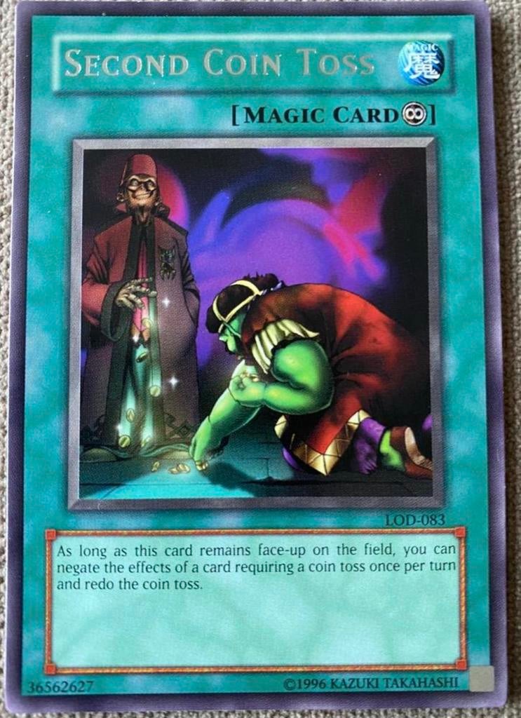 Yu-Gi-Oh! Second Coin Toss LOD Old US Print !, Ophalen of Verzenden, Zo goed als nieuw, Losse kaart