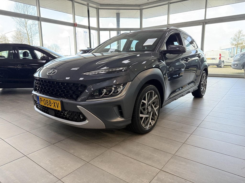 Hyundai Kona 1.6 GDI Hybrid 105PK Premium Automaat Lederen b, Auto's, Hyundai, Gebruikt, Euro 6, 2 kWh, Origineel Nederlands