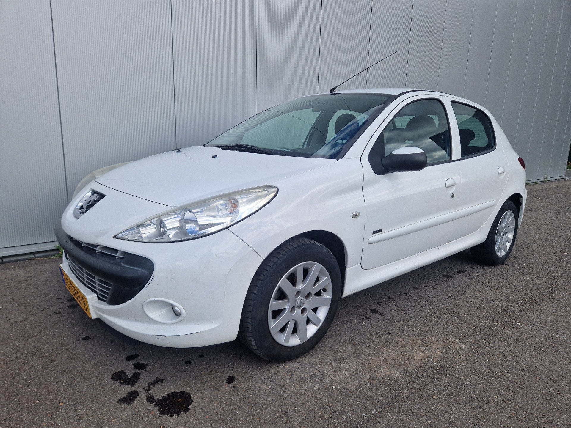 Peugeot 206+ 1.4 Sportium (bj 2011), Auto's, 4 cilinders, Wit, Origineel Nederlands, Bedrijf