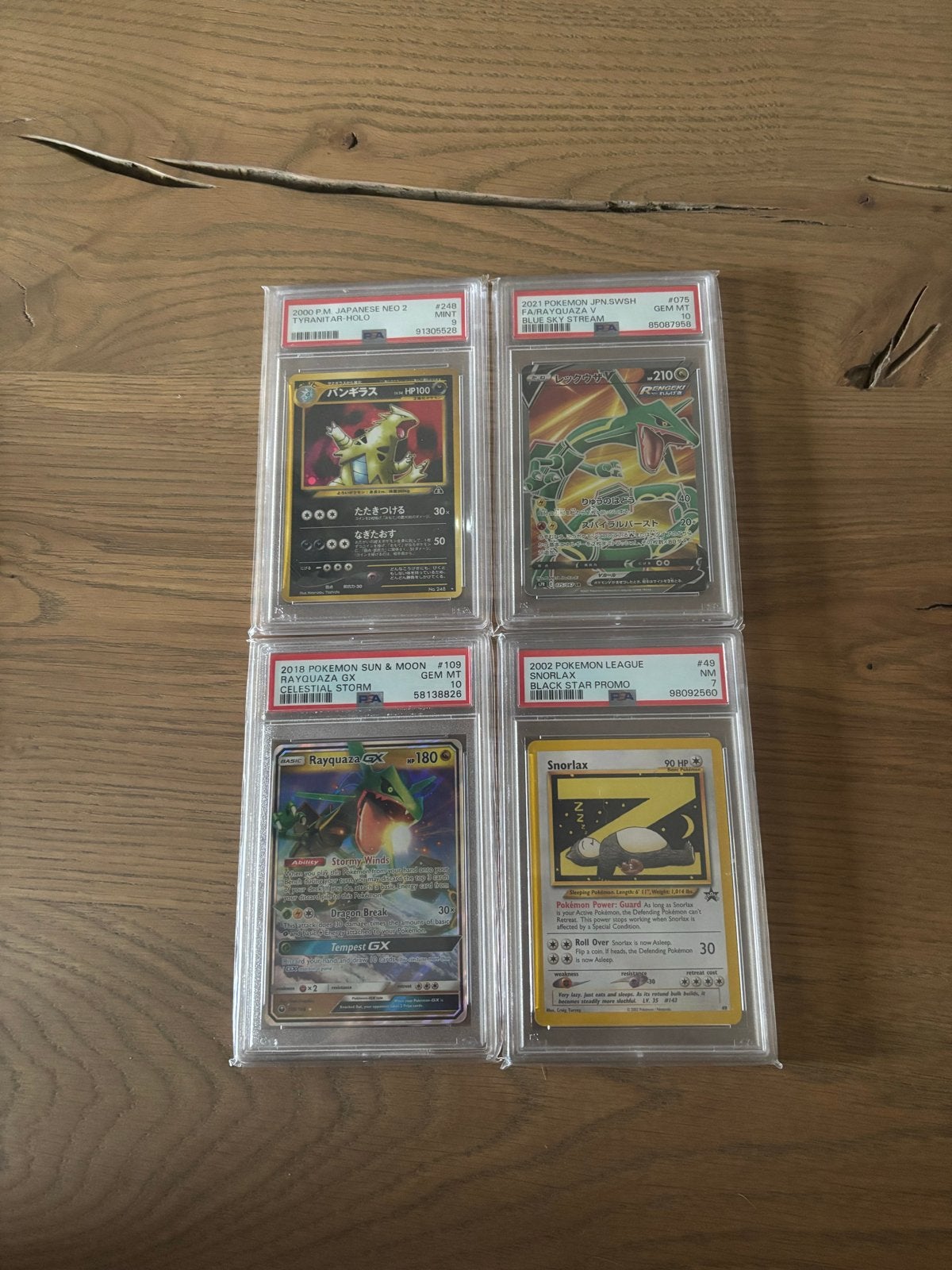PSA Pokemon Slabs - Tyranitar, Rayquaza, Snorlax, Ophalen of Verzenden, Zo goed als nieuw, Meerdere kaarten, Foil