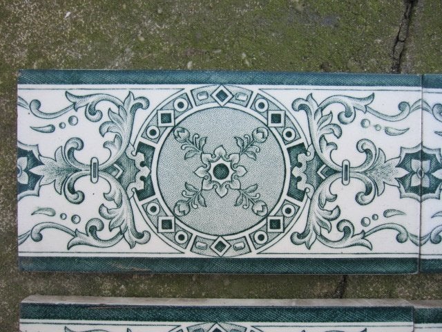 70 Art nouveau randtegels met donkergroene afbeelding, Ophalen