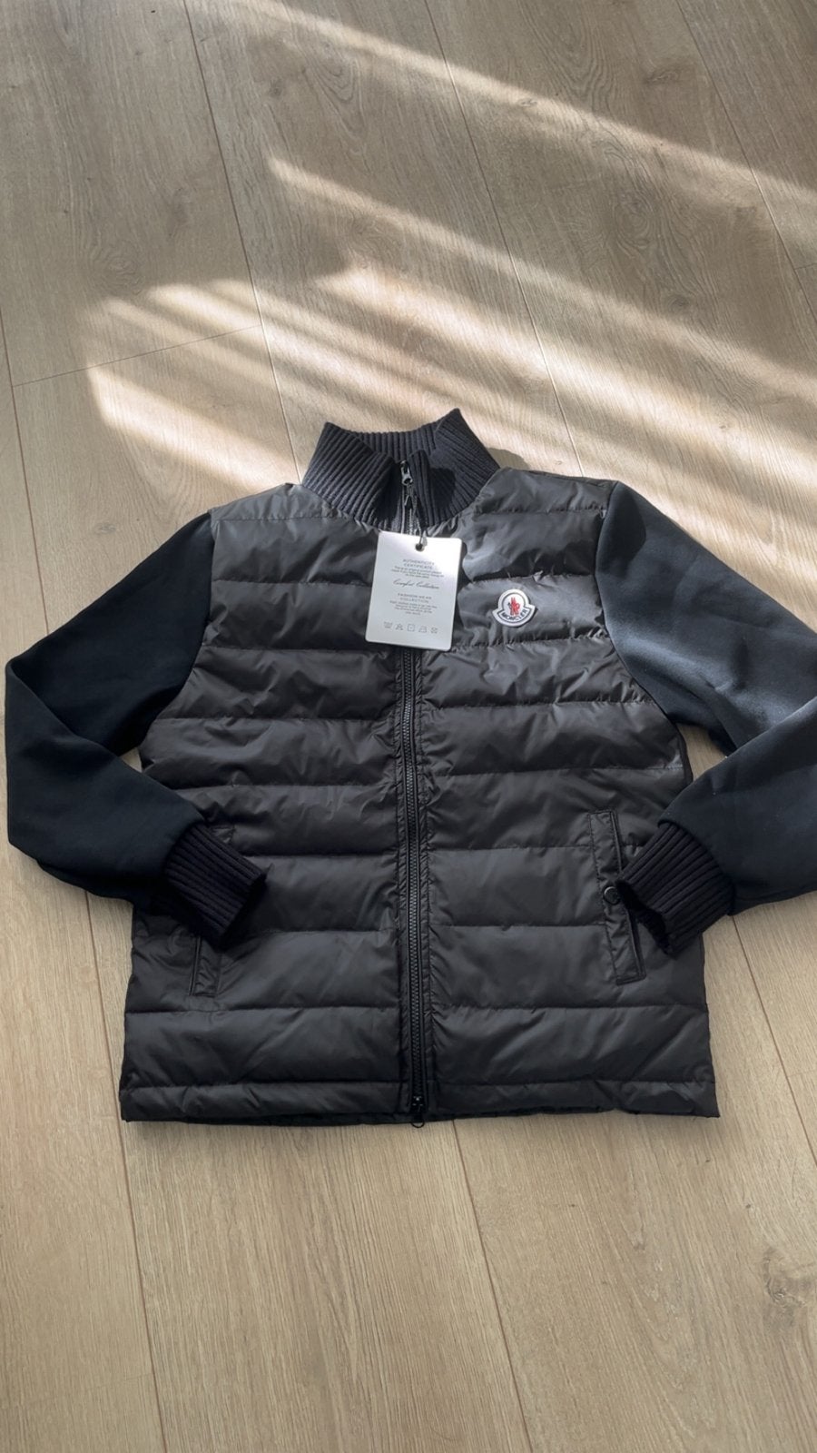 Moncler jas met gebreide mouwen - Zwart, Ophalen of Verzenden, Nieuw, Maat 52/54 (L), Zwart