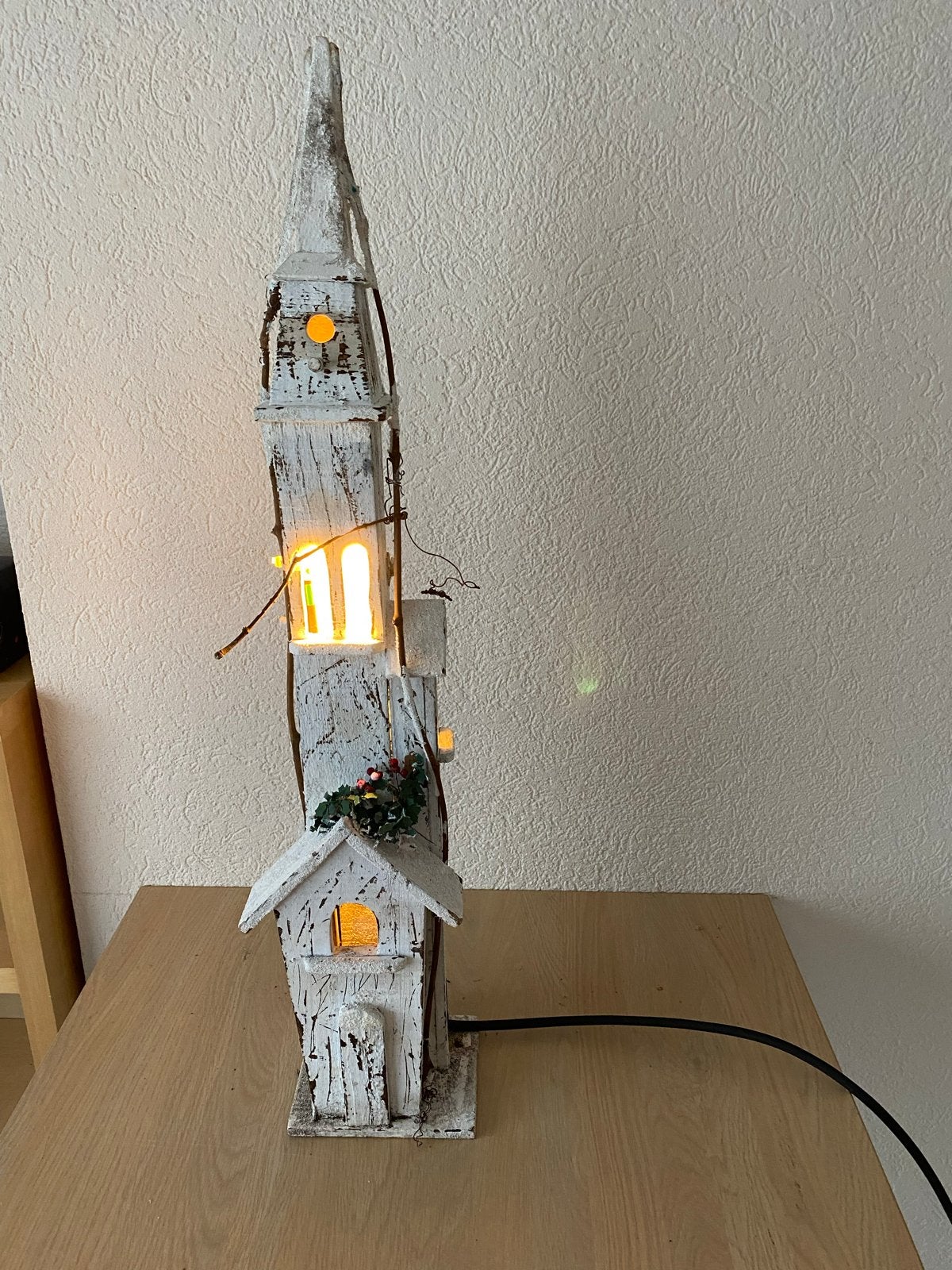 Kerk met verlichting voor kerstmis, Ophalen