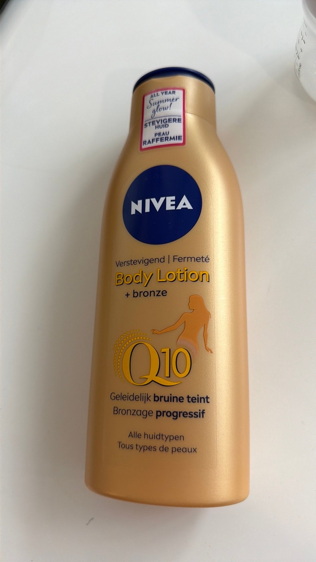 body lotion+bronze, Ophalen of Verzenden, Zo goed als nieuw, Bodylotion, Crème of Olie