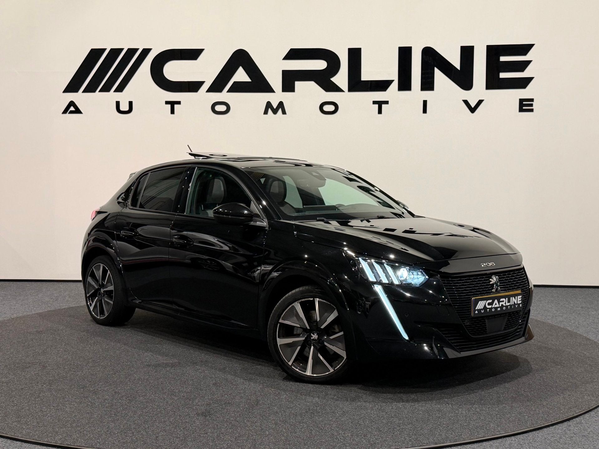 Peugeot E-208 EV GT 350 50 kWh SCHUIFDAK AIRCO NAVI STOELVER, Auto's, Gebruikt, Zwart, Zwart, Origineel Nederlands
