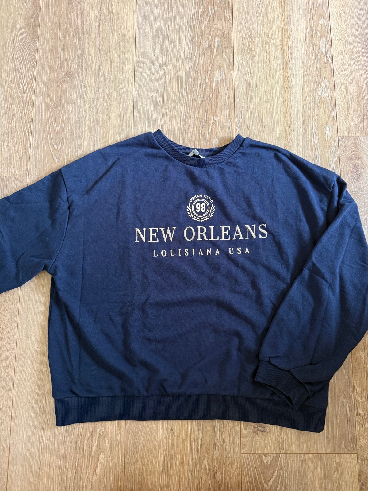 Donkerblauwe sweater met 'New Orleans' opdruk, Ophalen of Verzenden, Zo goed als nieuw, Maat 42/44 (L), Blauw