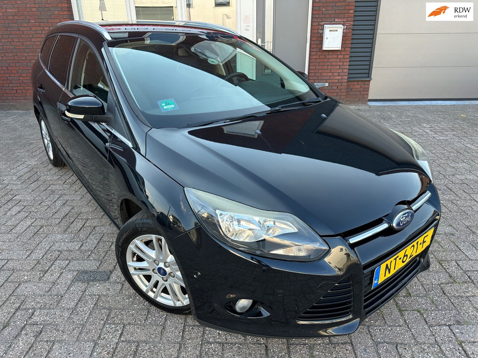 Ford Focus Wagon 1.0 EcoBoost Titanium / Riem vv / Clima / C, Euro 5, Gebruikt, Met garantie (alle), Zwart