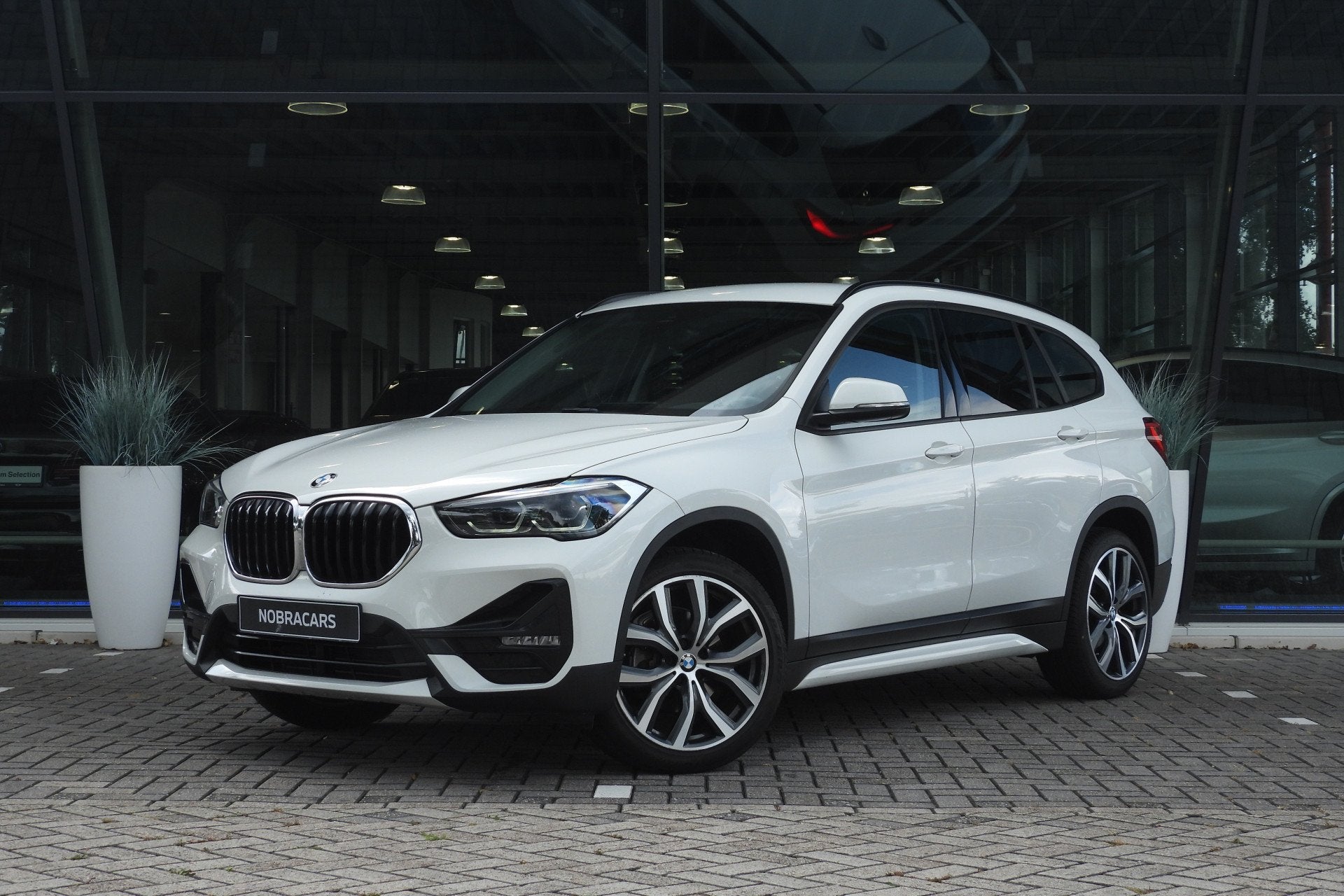 BMW X1 xDrive25e M Sport Automaat / Panoramadak / Sportstoel, Auto's, 8 kWh, Gebruikt, Zwart, Met garantie (alle)