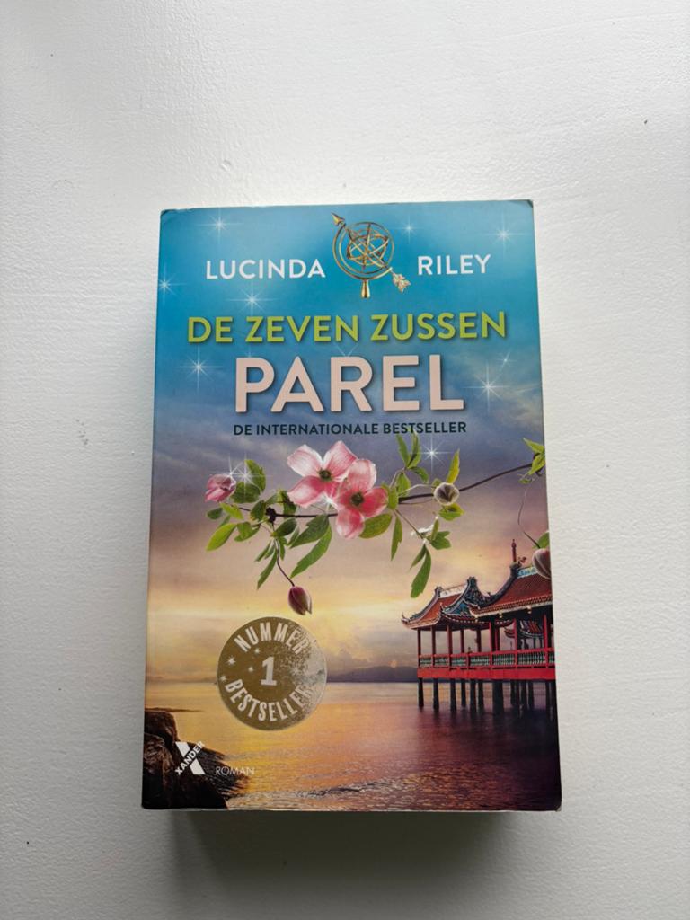 De Zeven Zussen - Parel (Lucinda Riley), Boeken, Romans, Gelezen, Europa overig, Ophalen of Verzenden