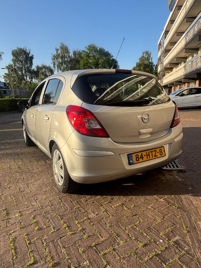 Opel Corsa 1.4 16V 5D 2009, Auto's, Opel, Voorwielaandrijving, Zwart, 4 cilinders, Overige bekleding