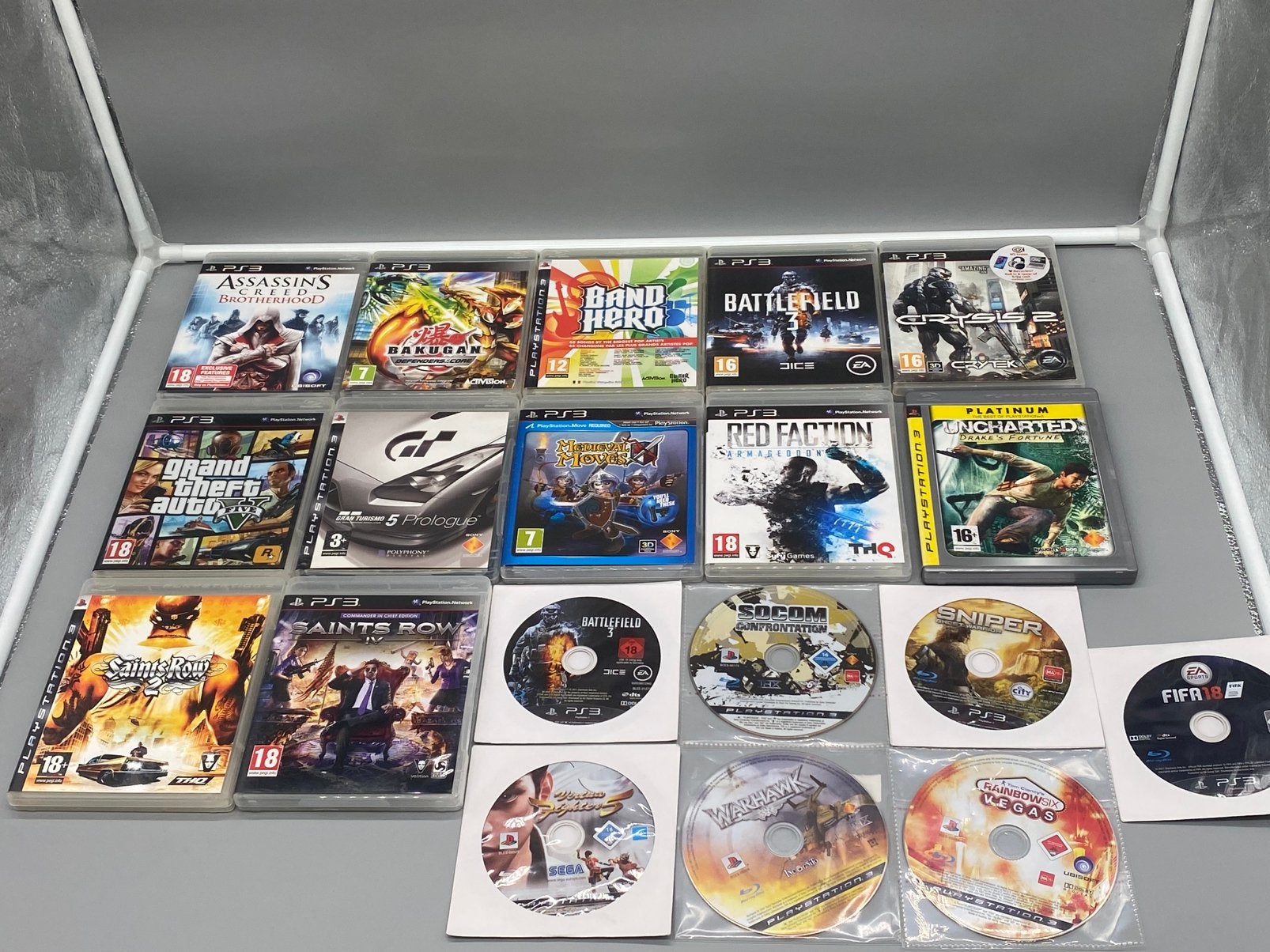 PS3 bundel 18 games GTA V Saints Row Uncharted + meer, Avontuur en Actie, Vanaf 18 jaar, 1 speler, Ophalen of Verzenden