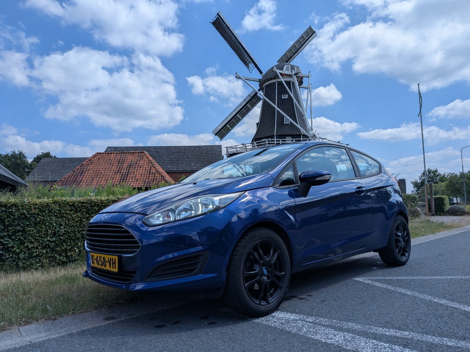 Ford Fiësta 1.25 44KW 3DR 2014 Blauw, Auto's, Stof, Stoelverwarming, 4 cilinders, Blauw