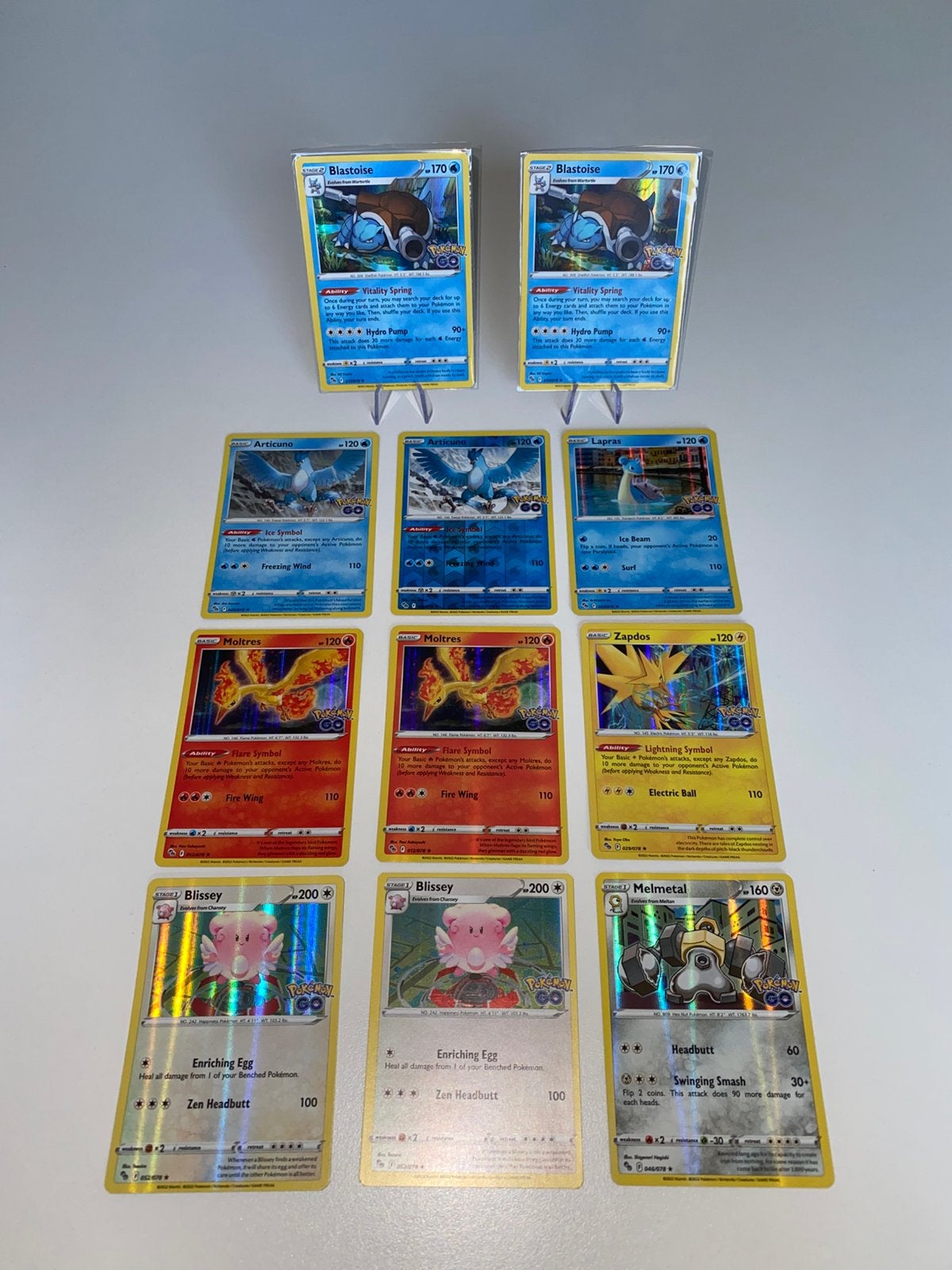 Pokemon Go Holo’s NM, Hobby en Vrije tijd, Verzamelkaartspellen | Pokémon, Ophalen of Verzenden, Zo goed als nieuw