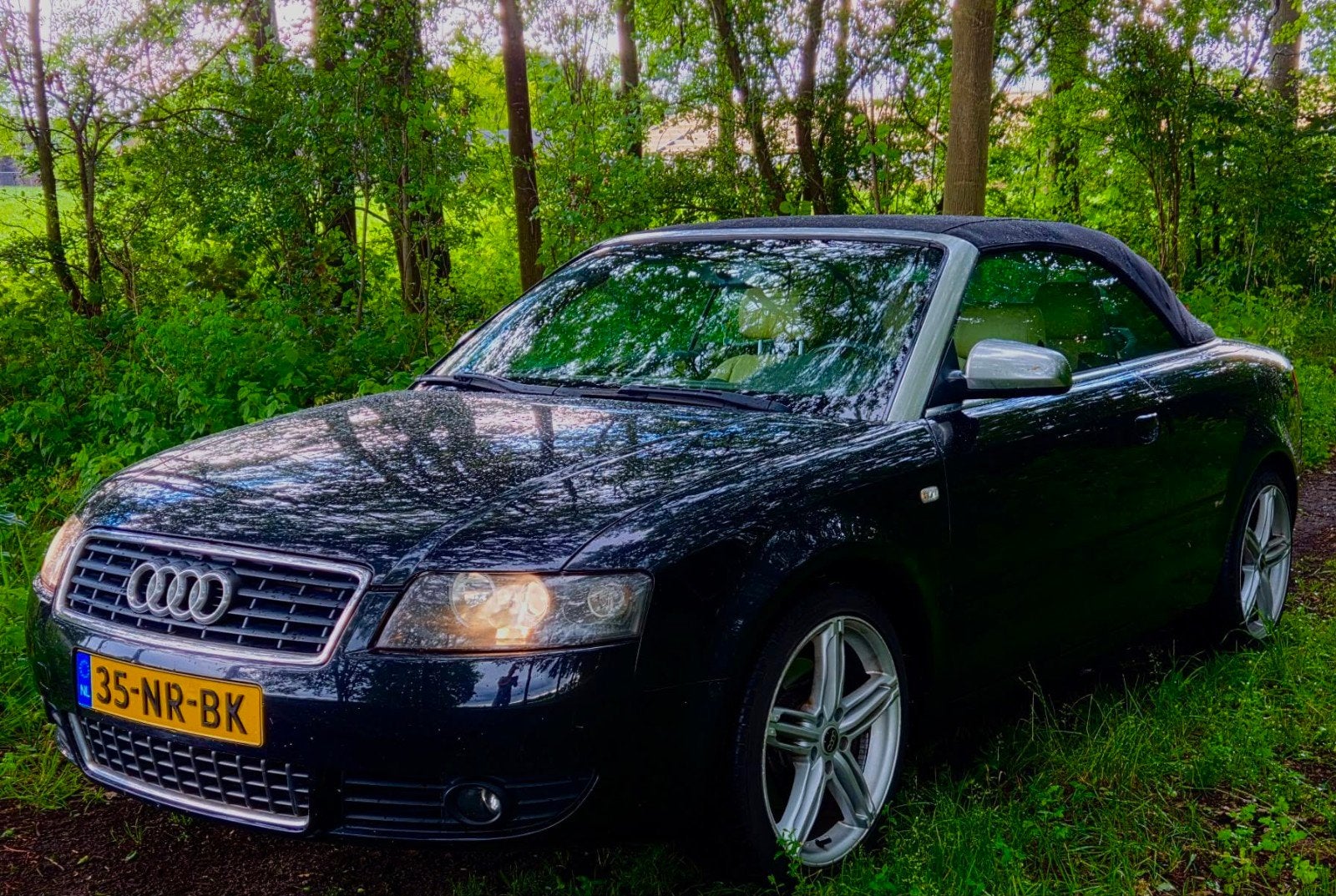 Audi A4 1.8 120KW Cabrio 2004 Zwart, Voorwielaandrijving, Beige, 4 cilinders, 4 stoelen