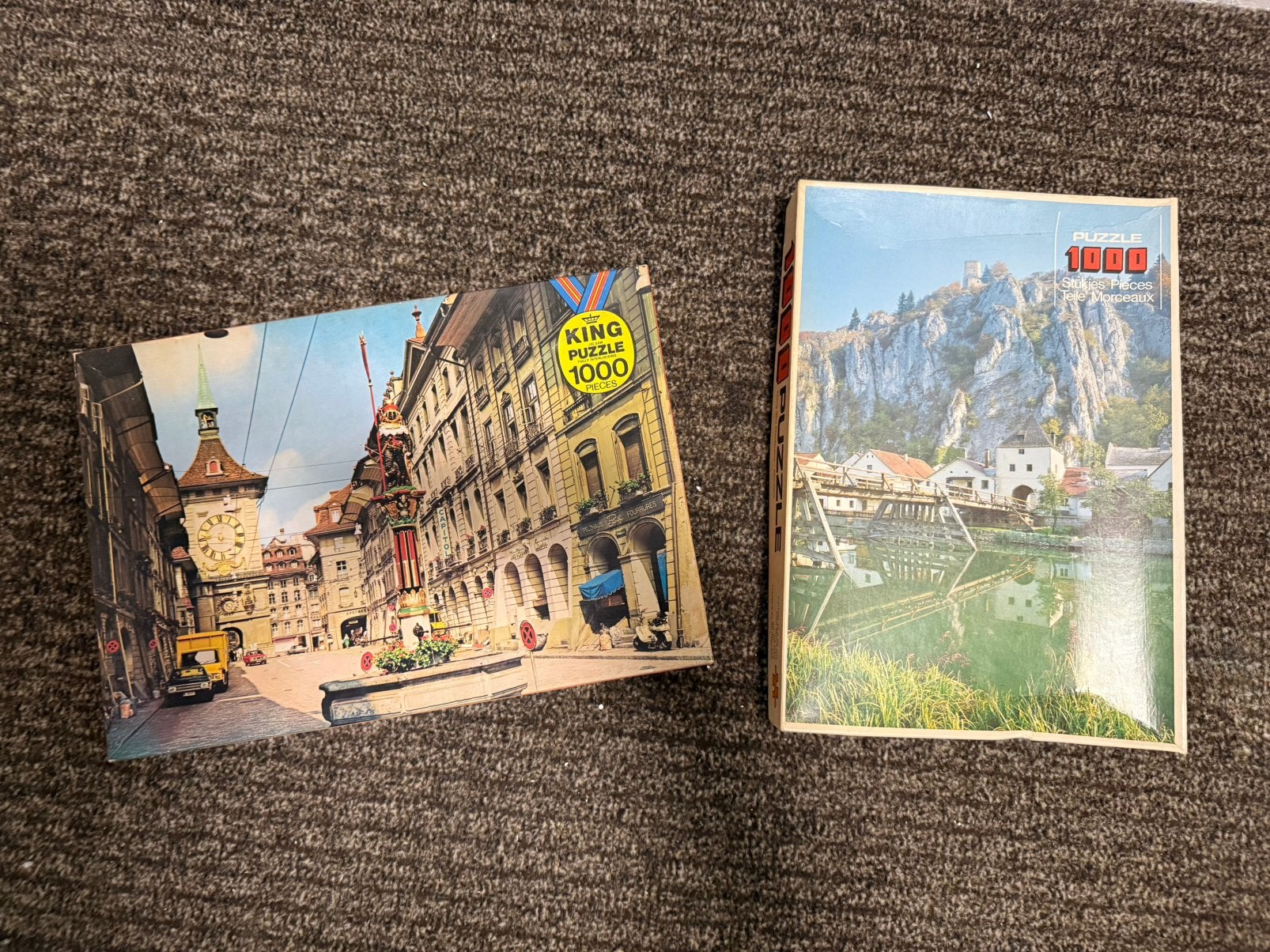 2 puzzels (1000 st) - Bern Zytglogge & Altmühltal Duitsland, Ophalen of Verzenden, 500 t/m 1500 stukjes, Nieuw, Legpuzzel