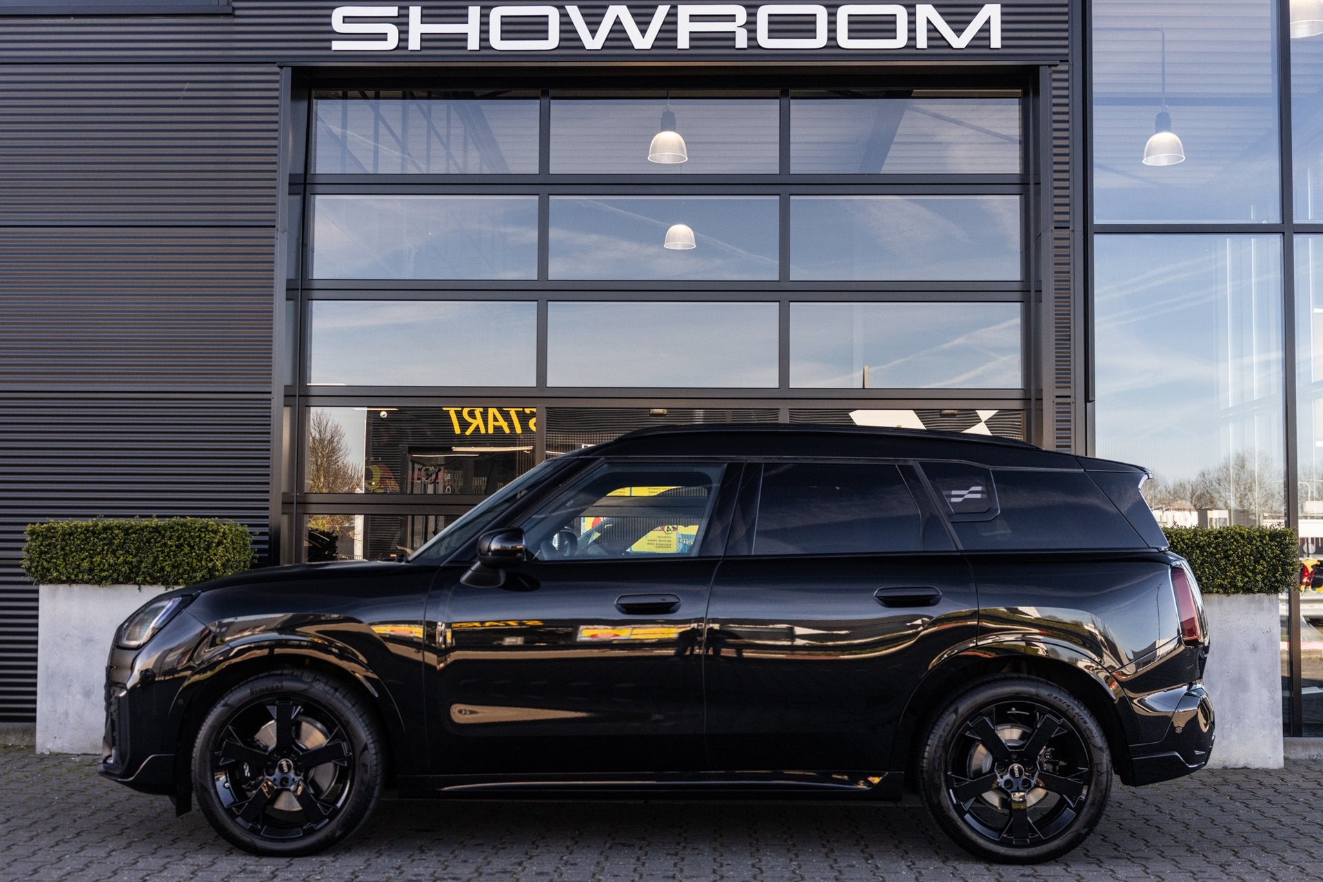 Mini Countryman 1.5 C John Cooper Works NL Auto, Pano, Camer, Dealer onderhouden, Gebruikt, Leder en Stof, Zwart