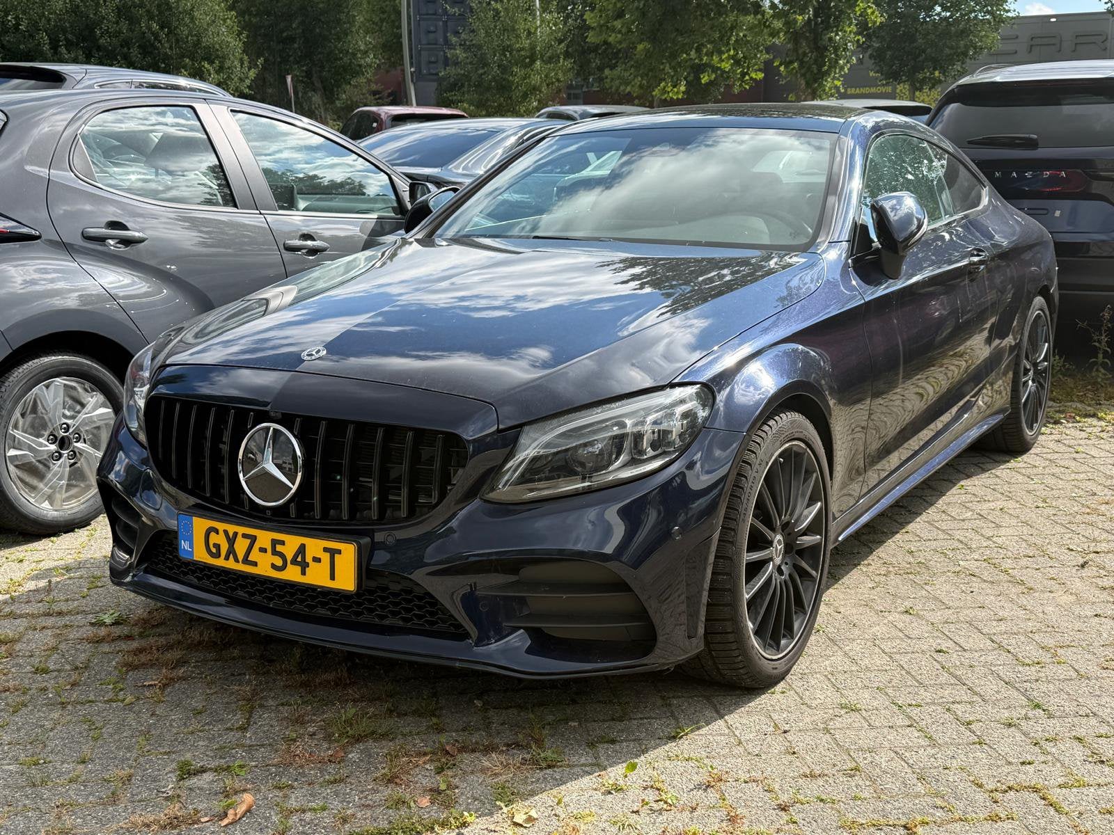 Mercedes-Benz C-Klasse C400 Coupé 333pk 4MATIC 9G 2019, Auto diversen, Blauw, 2996 cc, Mercedes-Benz, Benzine