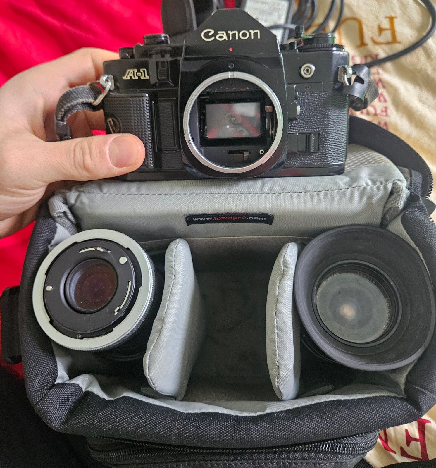 Canon A-1 Spiegelreflexcamera met 2 lenzen en tas, Audio, Tv en Foto, Fotocamera's Analoog, Ophalen of Verzenden, Gebruikt, Spiegelreflex
