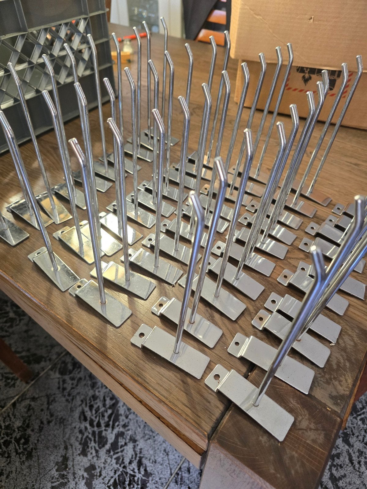 Slatwall haken 50 stuks, Ophalen of Verzenden, Zo goed als nieuw