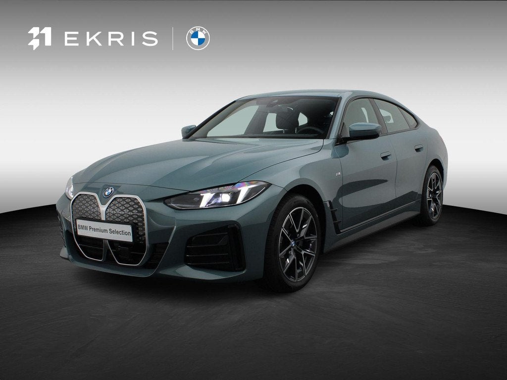 BMW i4 eDrive 35 M Sportpakket | Comfort Pack | Achteruitrij, Auto's, BMW, Gebruikt, Zwart, Met garantie (alle), 420 min