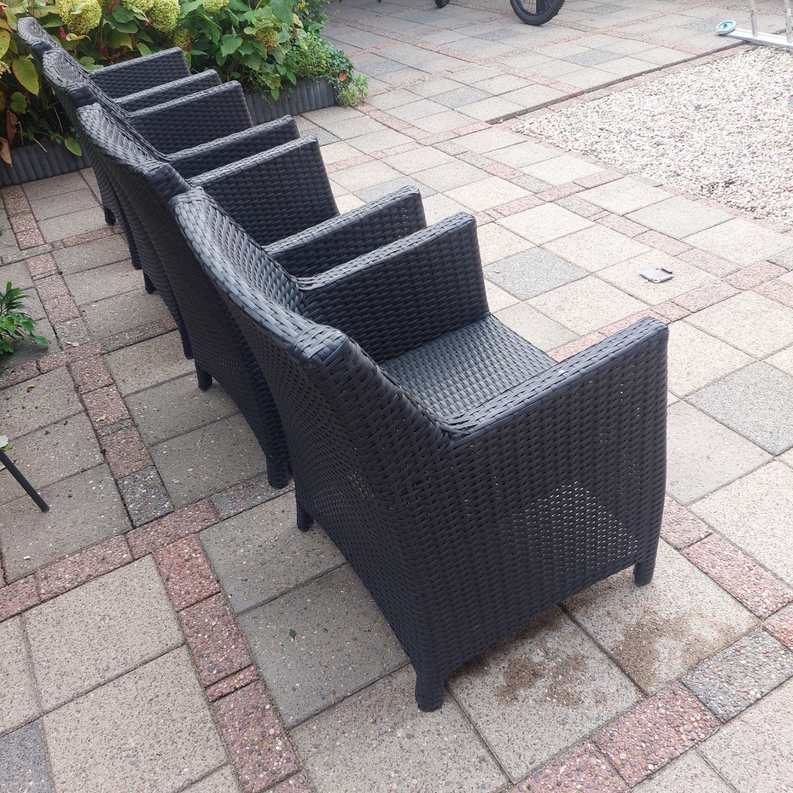 Set van 4 donkergrijze terrasstoelen van kunststof., Ophalen, Gebruikt, Kunststof