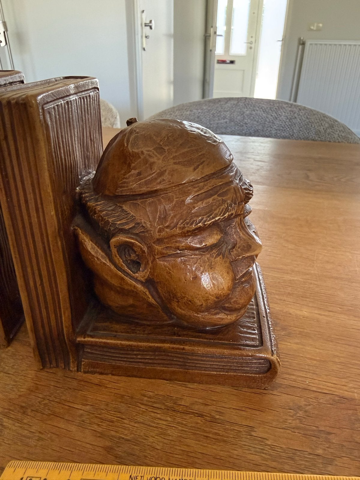 Antieke houten boekensteunen met monnikshoofden, Ophalen of Verzenden